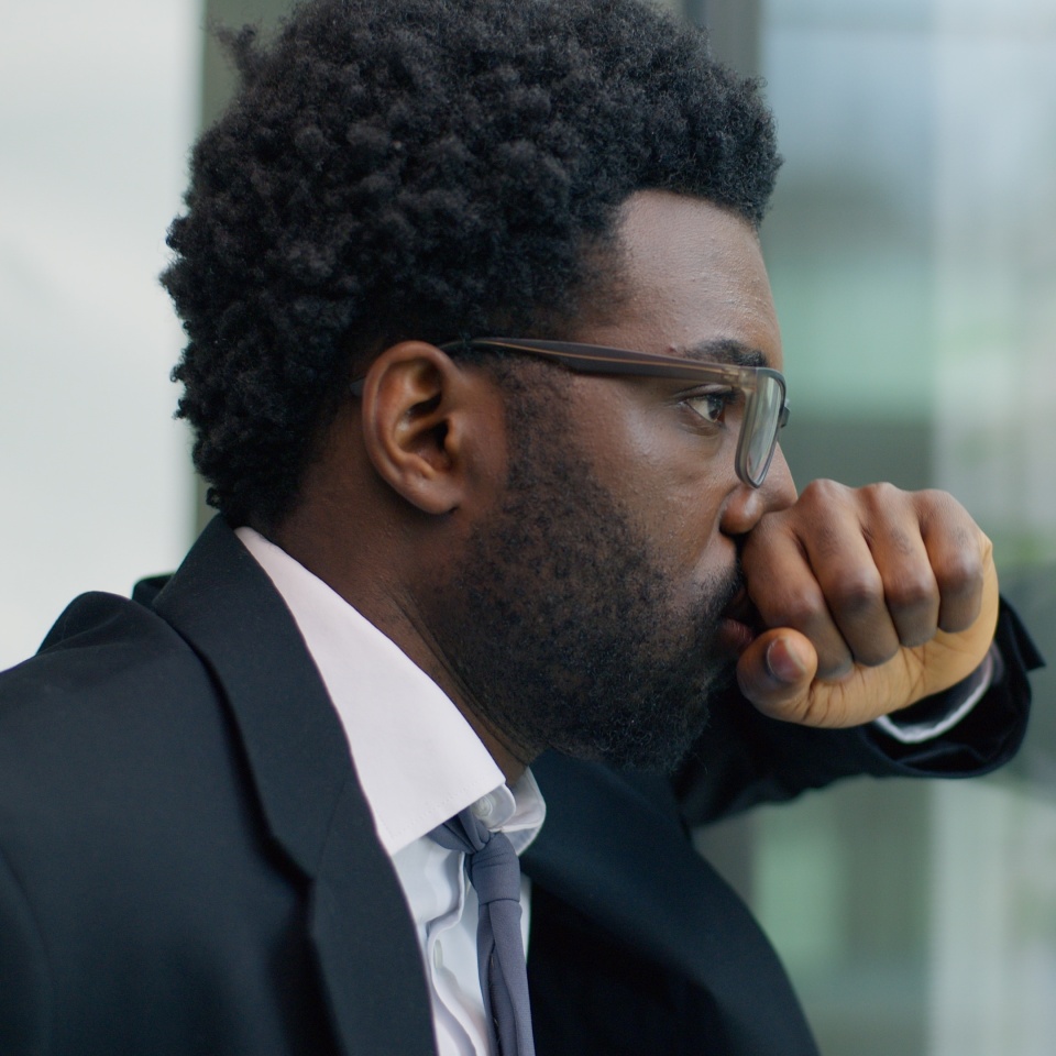 Suffering African American man business guy male businessman stressed overworked panic attack leaning glass of window in office problem bankruptcy dismissal unemployment trouble stress work failure. High quality 4k footage